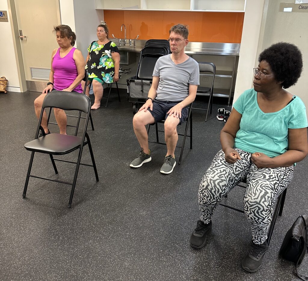 Participants enjoying a Chair Yoga session at Racham Care